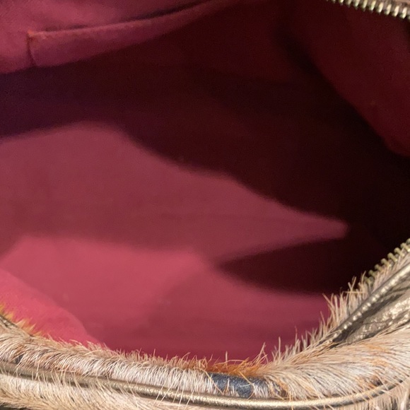 Real fur mid size distressed purse. - Picture 2 of 8